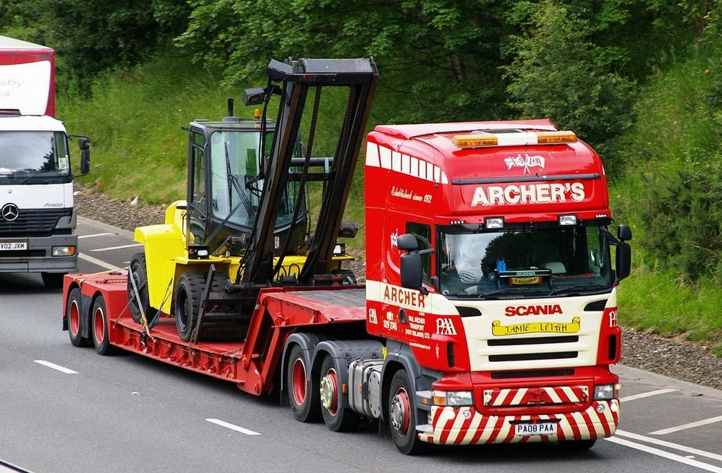 low loader transporting tall 8t counterbalance